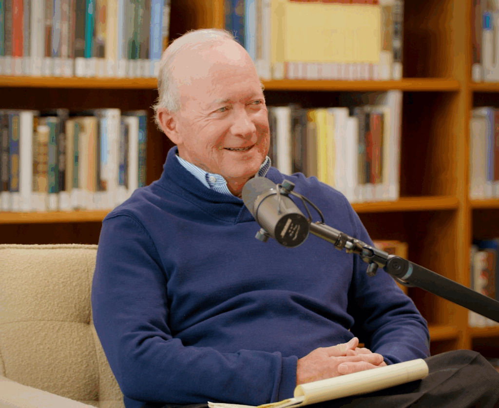 Governor Mitch Daniels sitting in a chair 